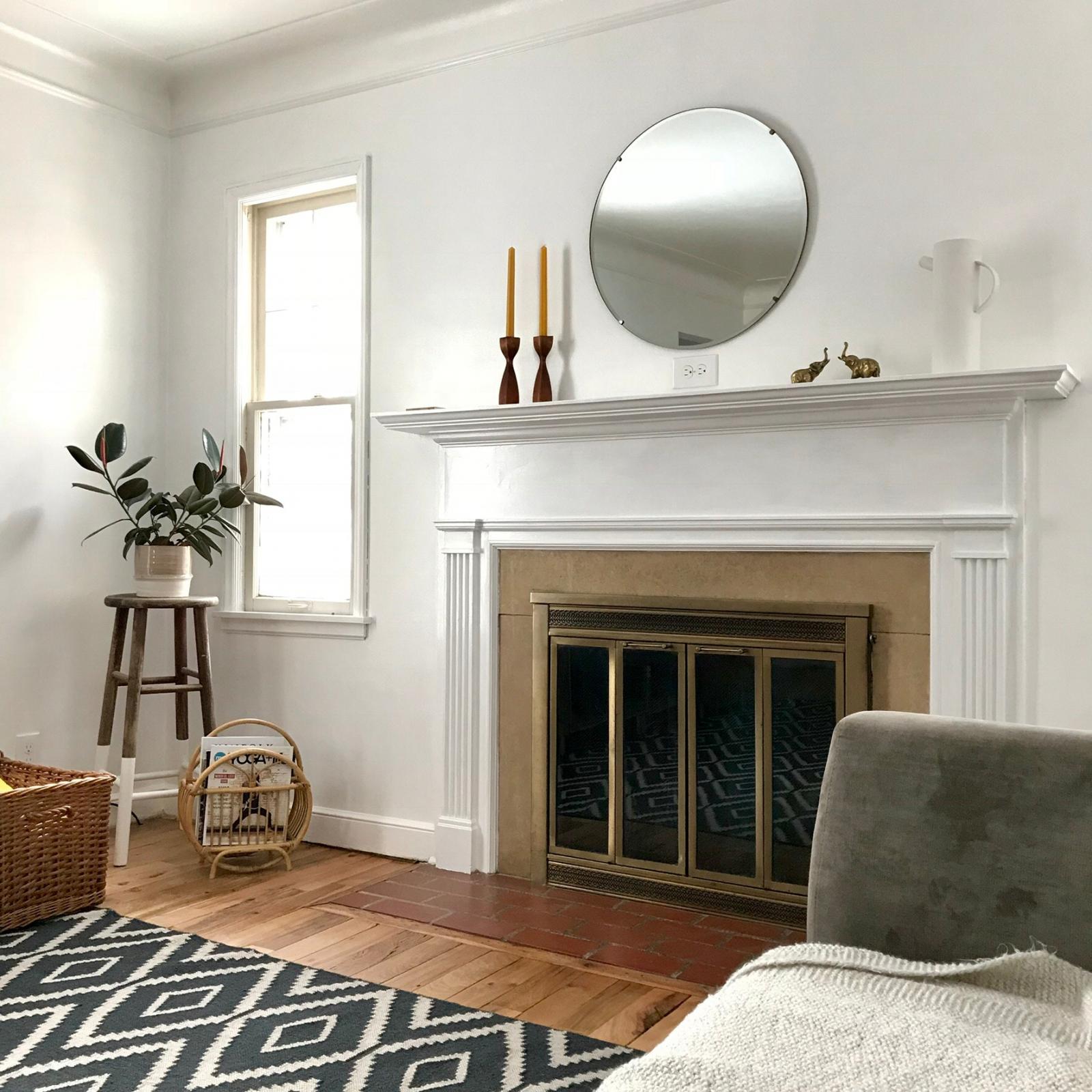 Fireplace and mirror in apt