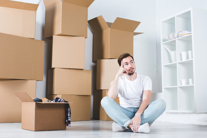 man ponding what to unpack first